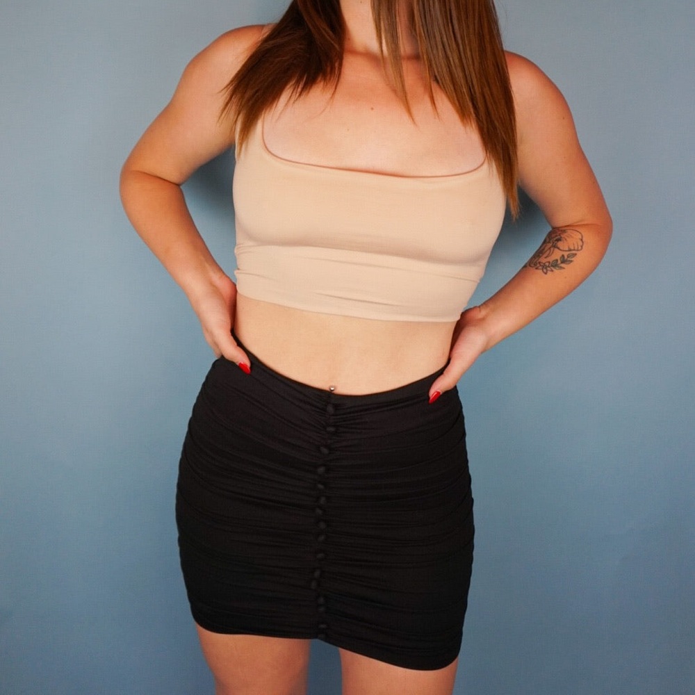 Black ruched mini skirt with button details down the front & zipper on back